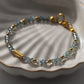 Kely Armband, Glaskristallen