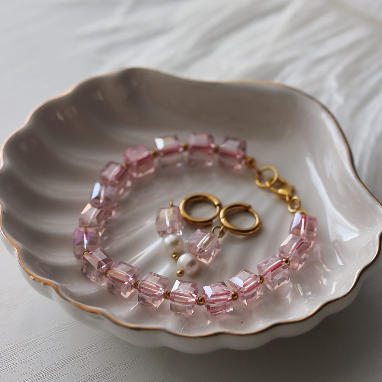 Rosa Armband, Glaskristallen