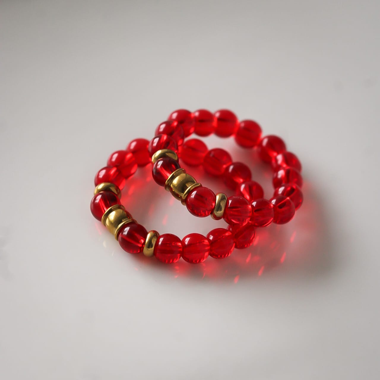 Amore Ring, Glasperlen